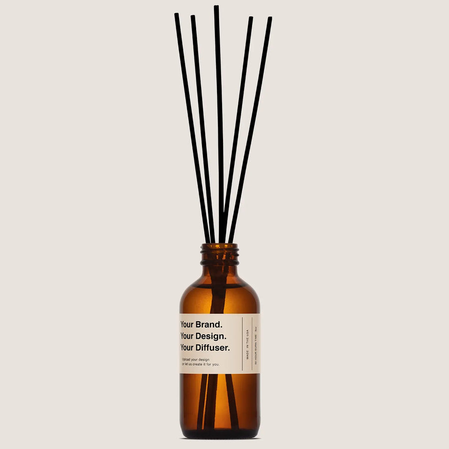 Custom amber glass reed diffuser for flame-free corporate spaces